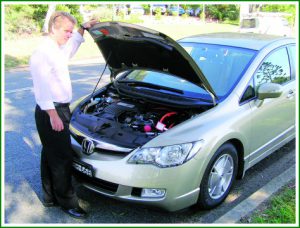 Hybrid car to reduce greenhouse gas emissons