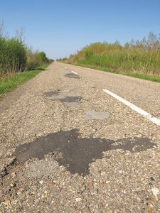 NSW councils struggling under huge road funding backlog
