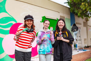 Local young artists paint mural for community